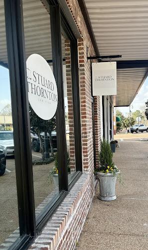 Negocio Stuard Thornton Law Firm